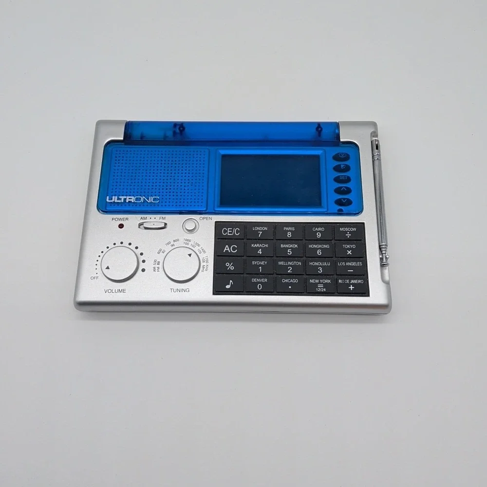 Ultronic WS-9 World Traveler Portable Flip Up Alarm Clock Radio Calculator